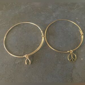 Gold Peace and Wishbone Charm Bangle Bracelets